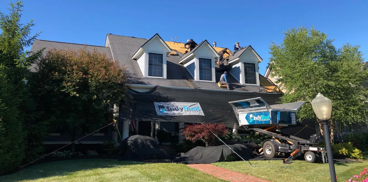 Emergency tarping on a Waterleaf roof